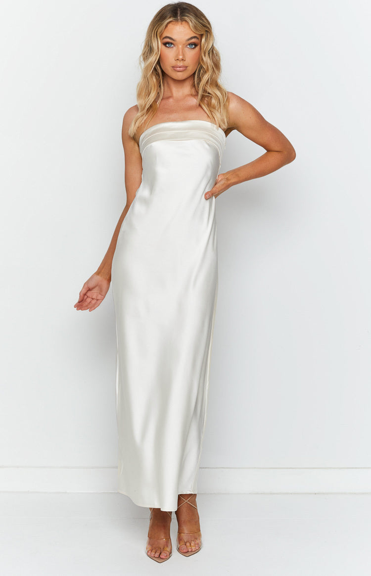 Front view of a white strapless maxi dress with a folded band neckline and a relaxed flowy fit
