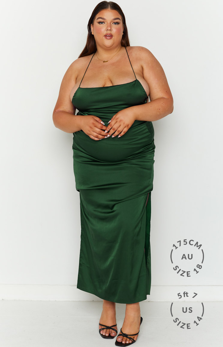 Emerald green satin maxi dress with a straight neckline, thin spaghetti straps, and a ruched side slit