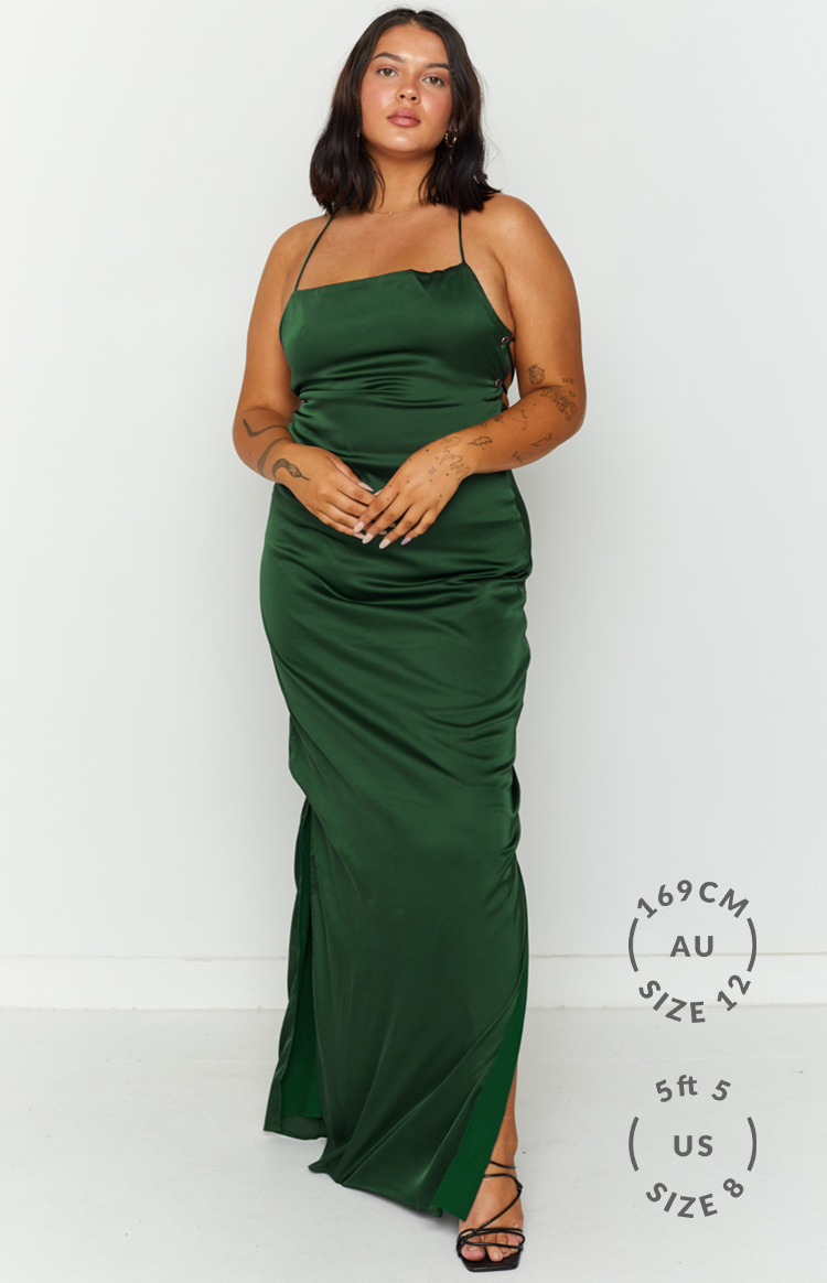 Emerald green satin formal dress with a square neckline, thin straps, side ruching, and a high leg split