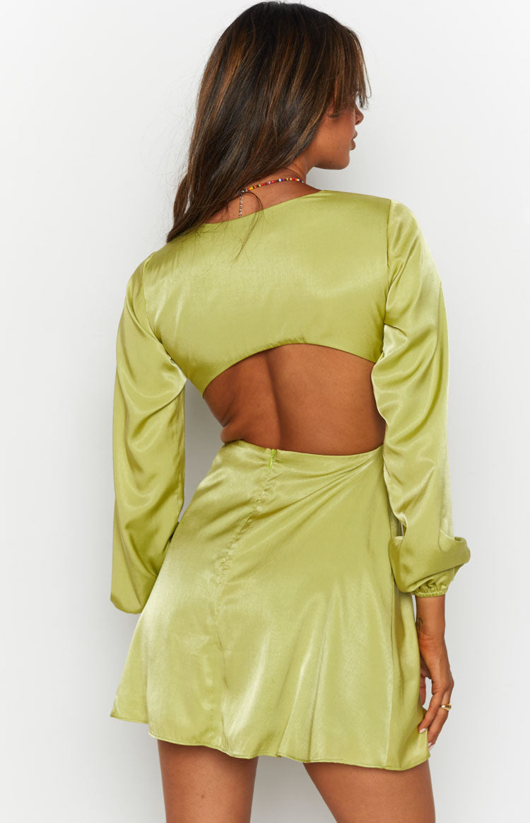 Green satin mini dress with long cuffed sleeves and a wide open back cut-out