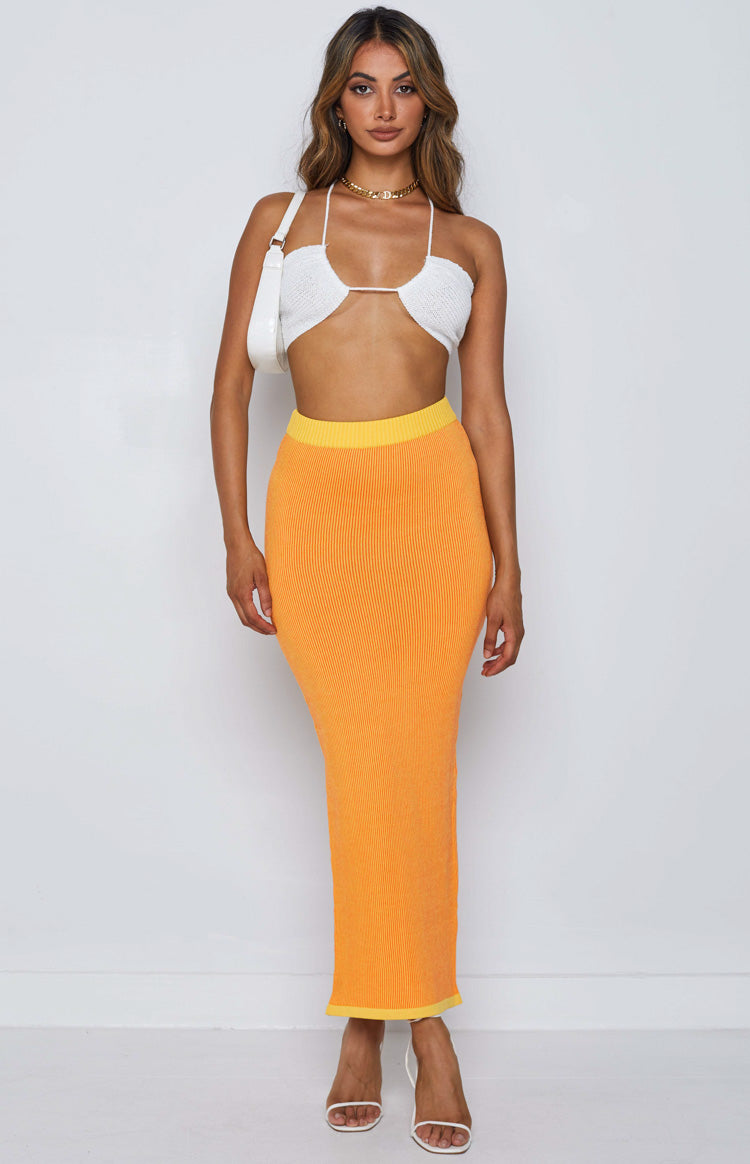 White knitted halter crop top with bandeau style cups and a thin connecting strap