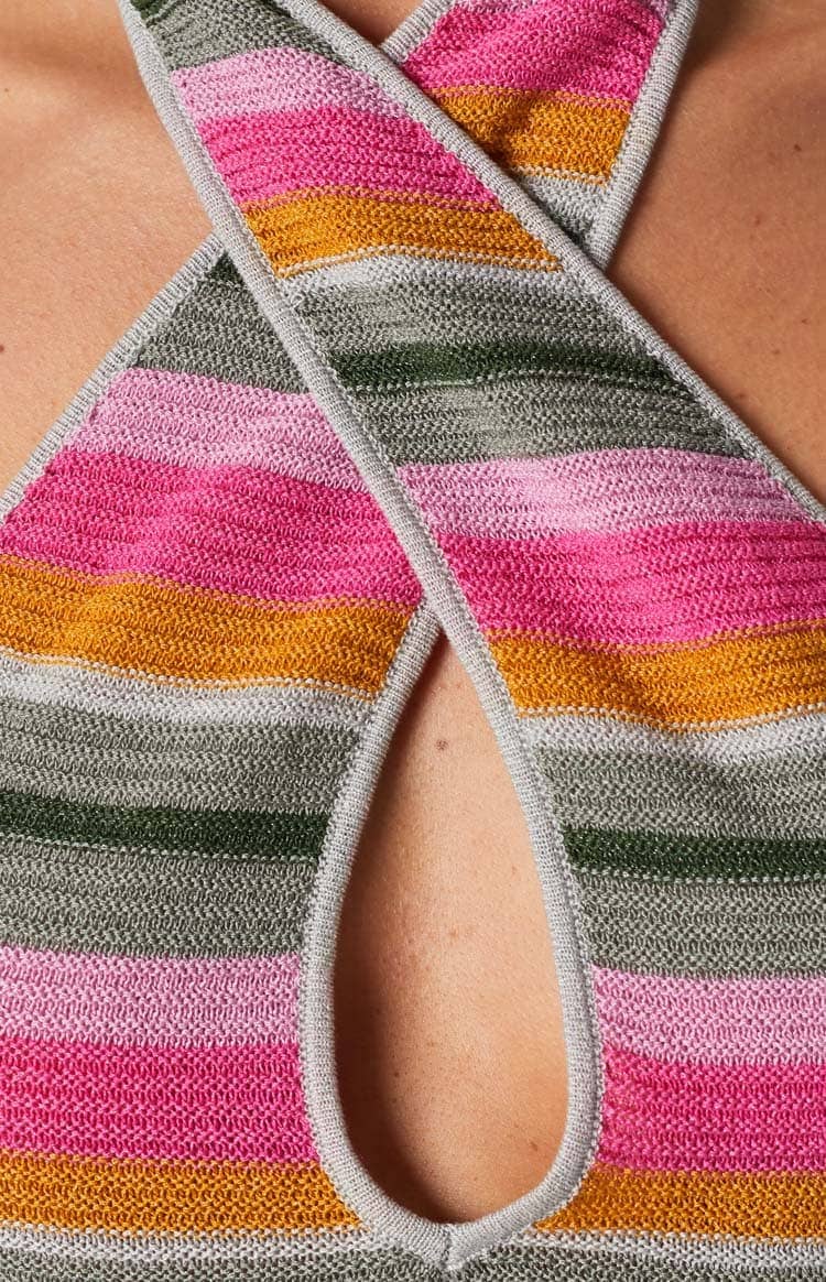 Close-up of the multi-striped knit halter top with pink, orange, grey, and dark green stripes and front keyhole neckline