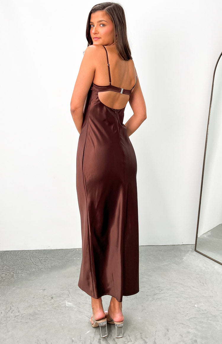 Rear view of a brown satin maxi dress with a low scoop back and adjustable bra-style strap with a silver clasp