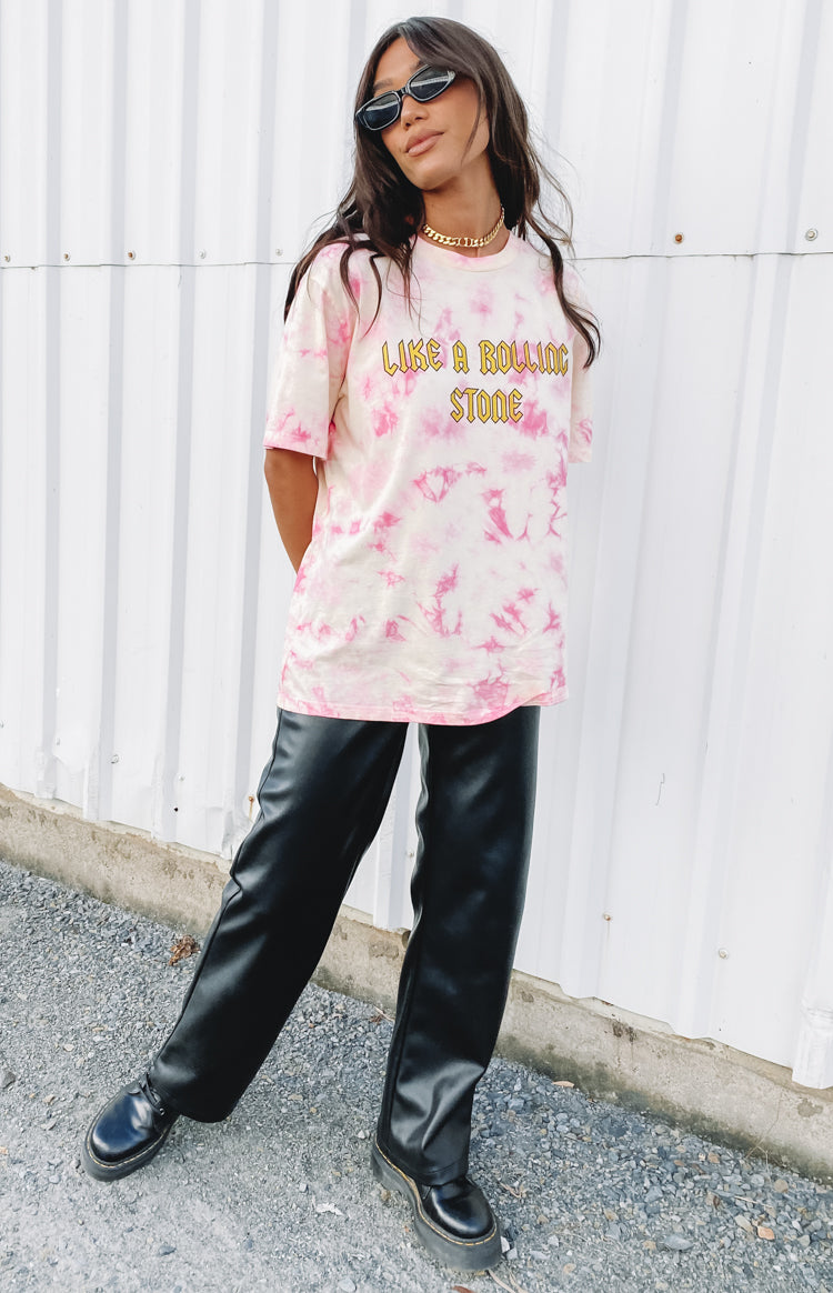 Crew neck pink tie-dye tee featuring 'LIKE A ROLLING STONE' yellow text