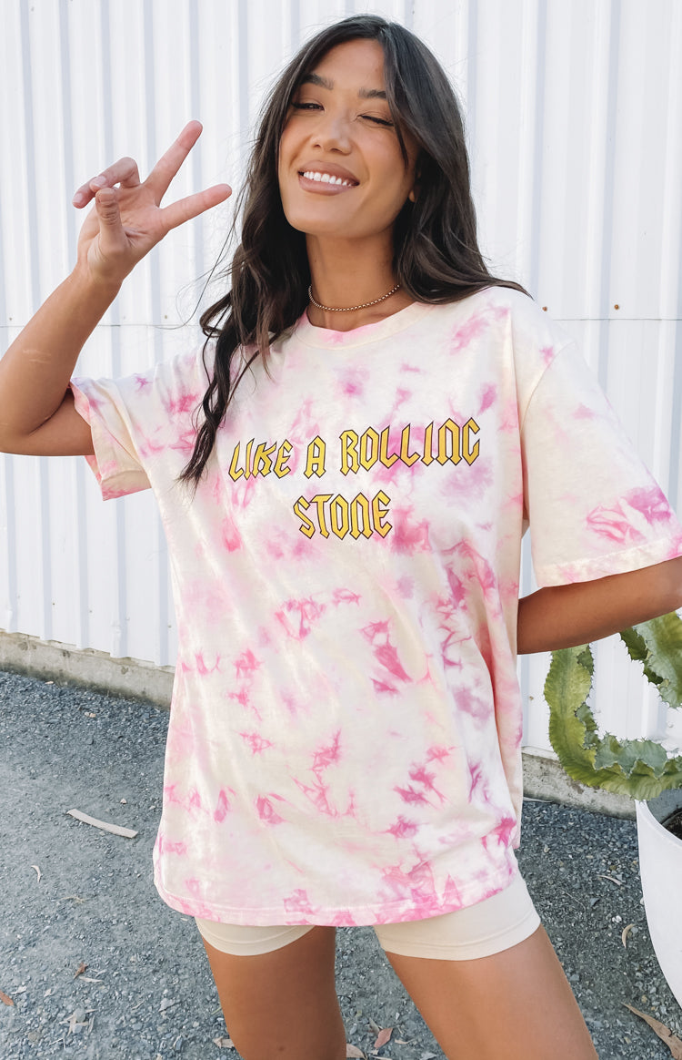 Cream and pink tie-dye oversized t-shirt with a crew neck and yellow 'LIKE A ROLLING STONE' text