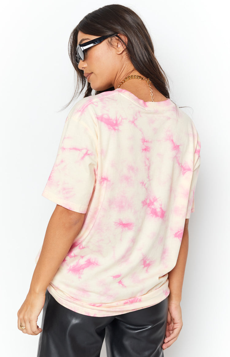 Back of a cream and pink tie-dye oversized t-shirt with short sleeves and a relaxed fit