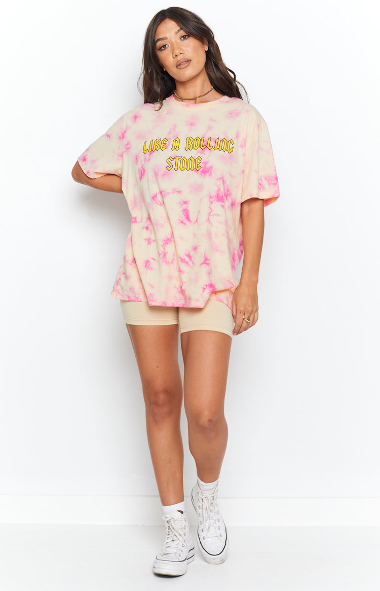 Oversized cream and pink tie-dye t-shirt with short sleeves and 'LIKE A ROLLING STONE' yellow slogan