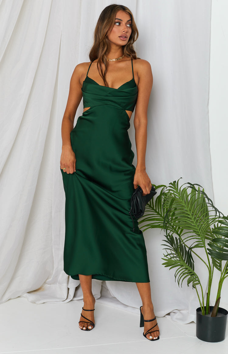 Deep green satin maxi dress with cowl neckline, thin spaghetti straps, and side waist cutouts
