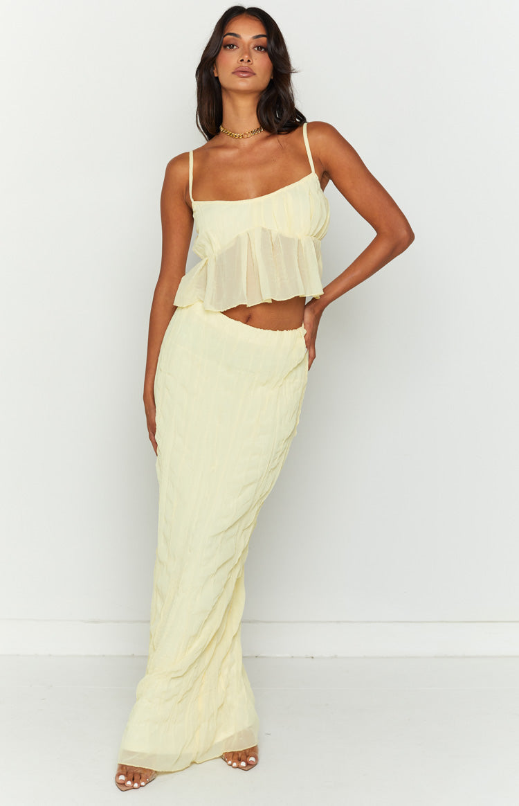 Yellow crinkled maxi skirt with an elasticated waist and a flowing silhouette