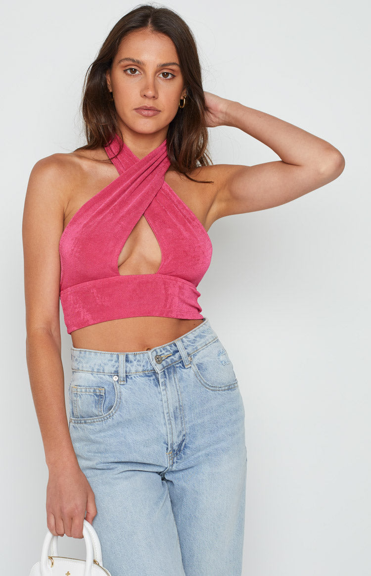 Beginning Boutique Tia Pink Cross Neck Top bright pink shimmery cross neck halter crop top with bust cutout