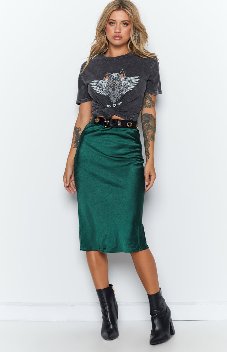 High-waisted emerald green satin midi skirt with a shimmering finish and elegant drape