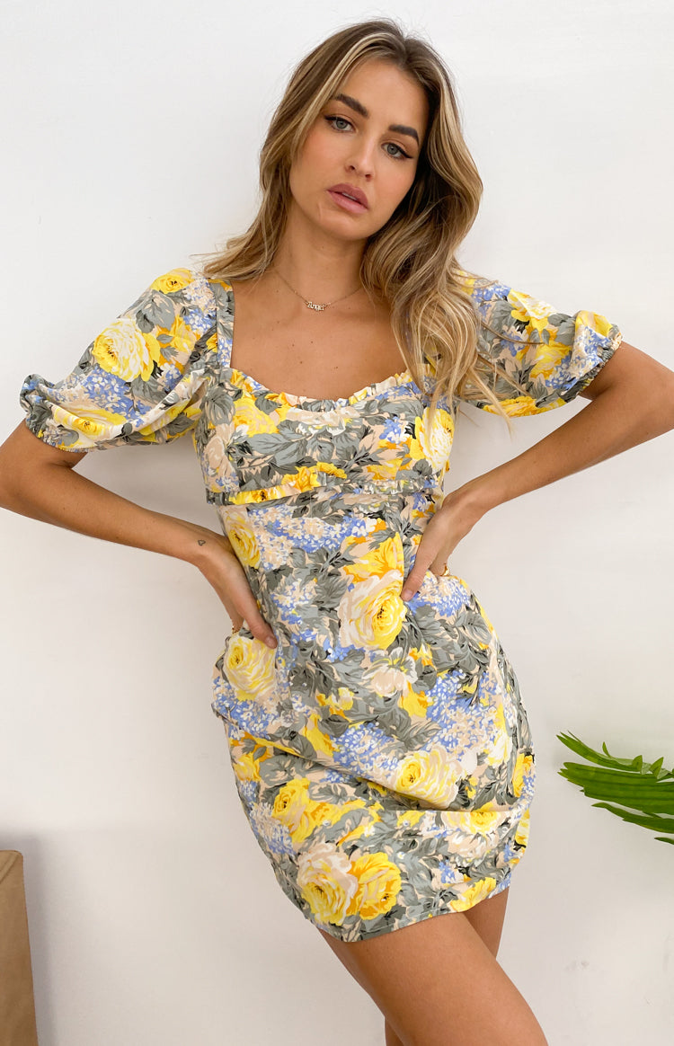 Yellow, blue, and grey floral mini dress with sweetheart neckline, short puff sleeves, and ruched bodice