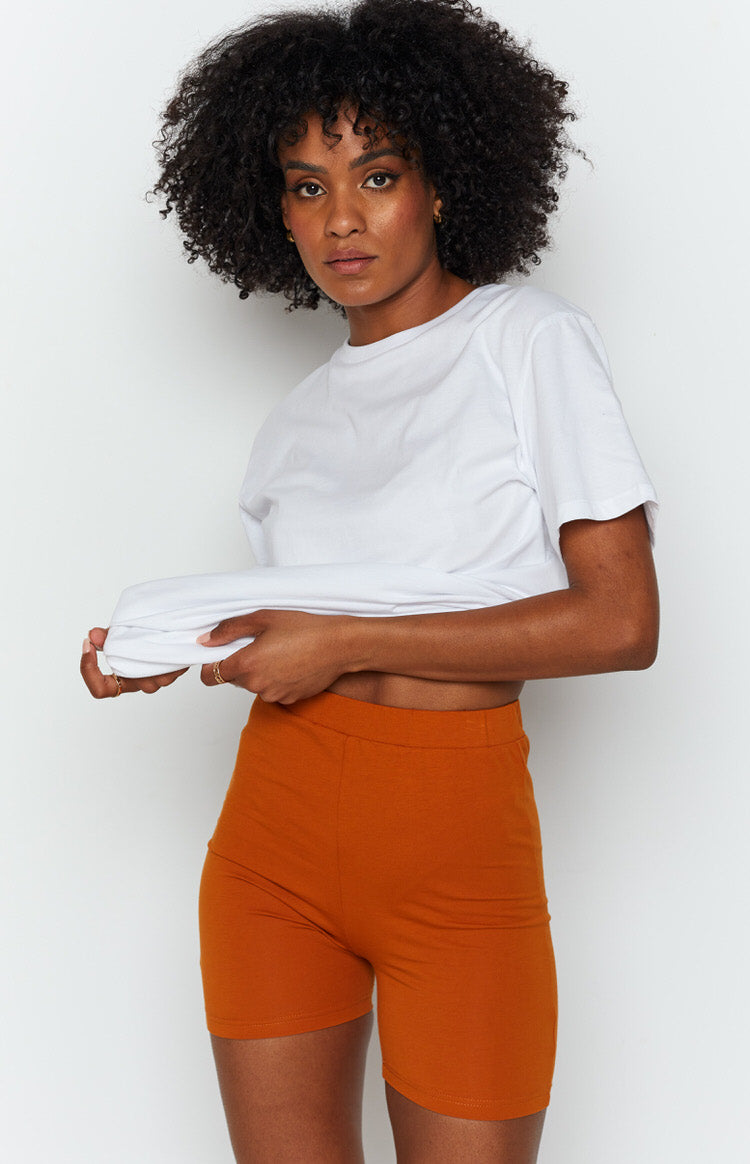Tan Wellness Shorts, high-waisted and fitted, in a soft jersey knit