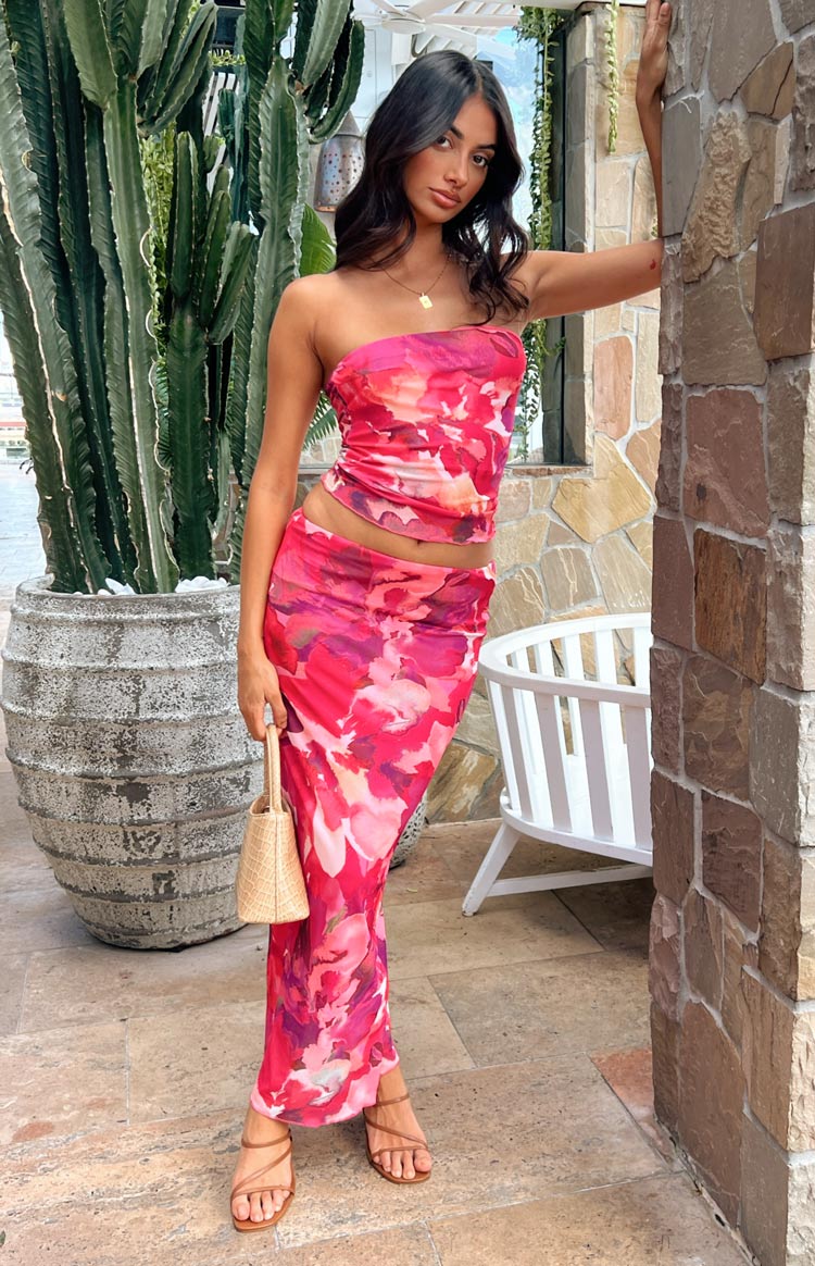 Full length pink floral print mesh maxi skirt with a fitted waist and soft, flowing silhouette