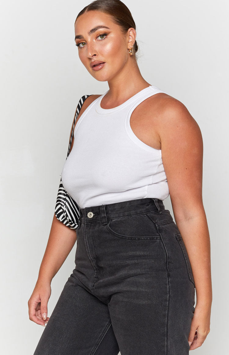 White ribbed knit tank top with a high crew neck and thick racerback straps