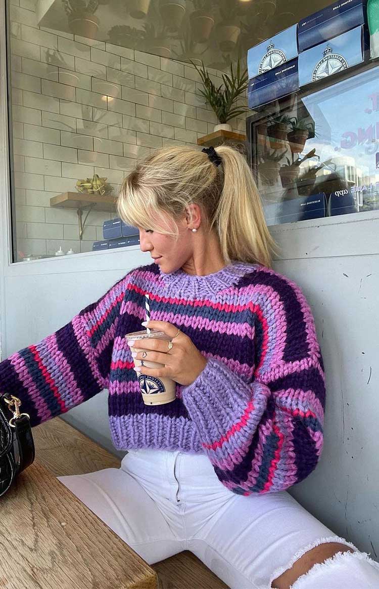 Cropped chunky knit sweater with purple, pink, and grey horizontal stripes