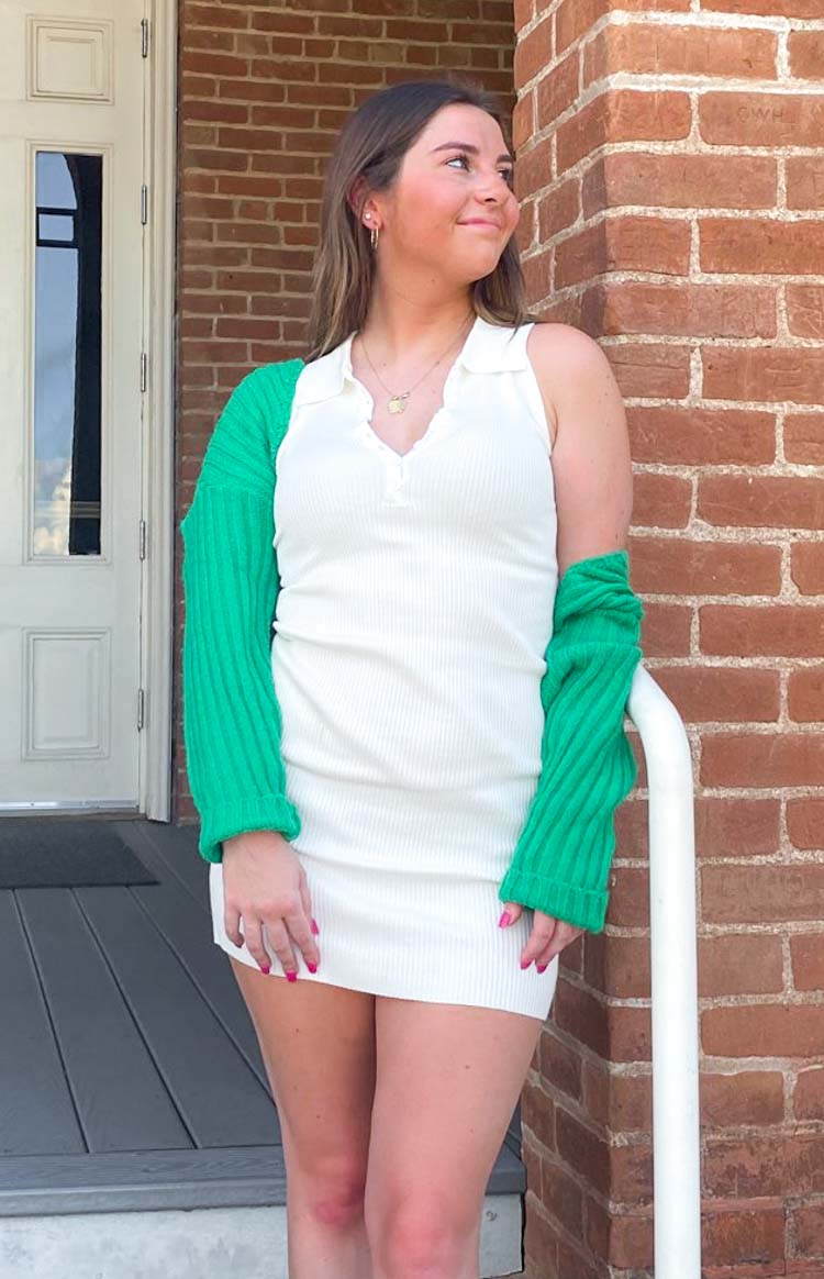 White ribbed mini dress with a collared V-neckline and a three-button placket