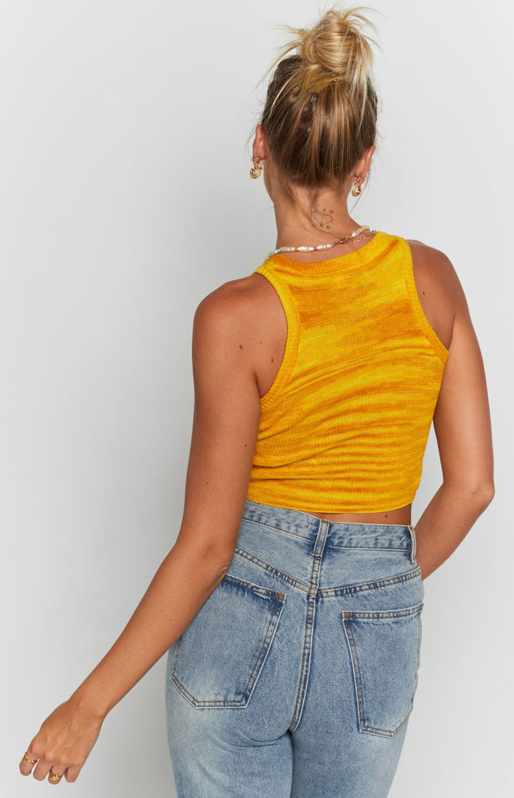 Fitted yellow and orange marled knit tank top with a high back and cropped length