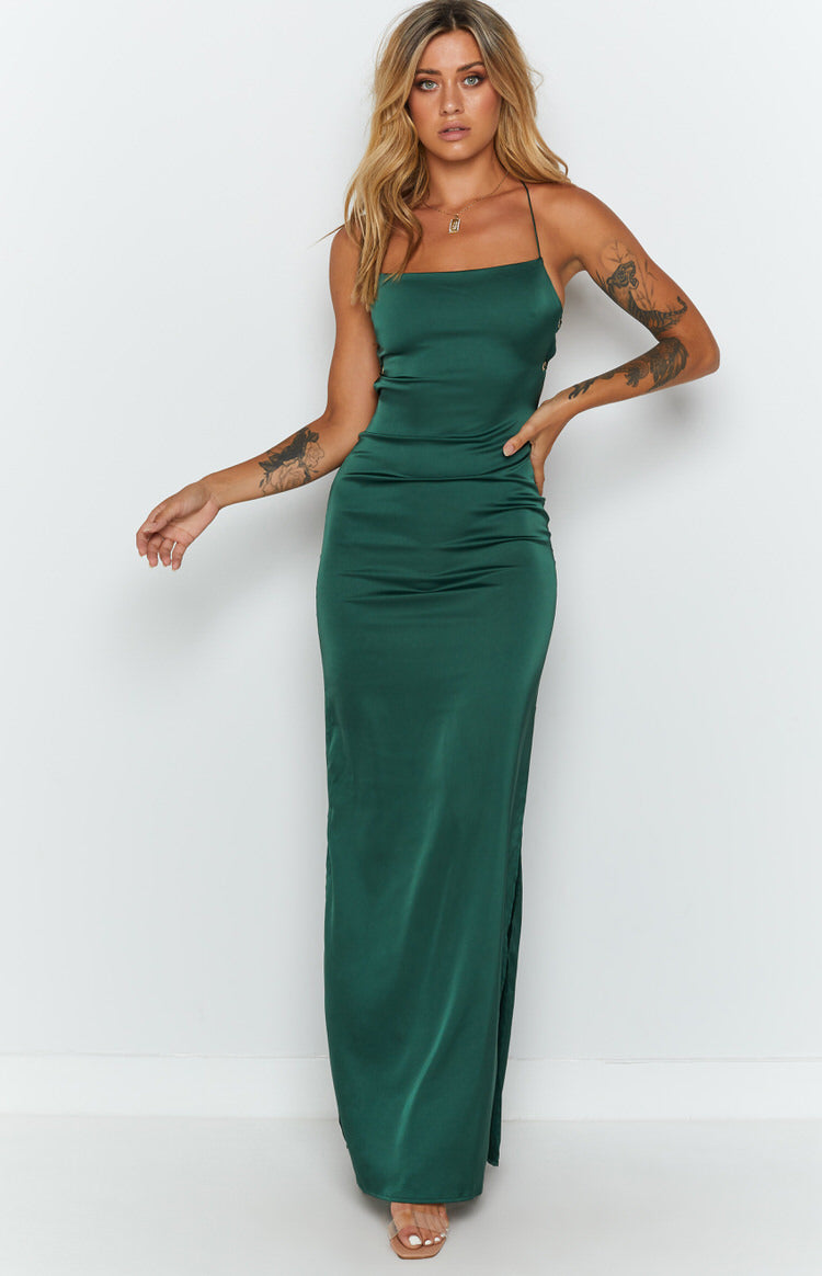 Emerald green satin maxi dress with a straight neckline, thin straps, and a high side split