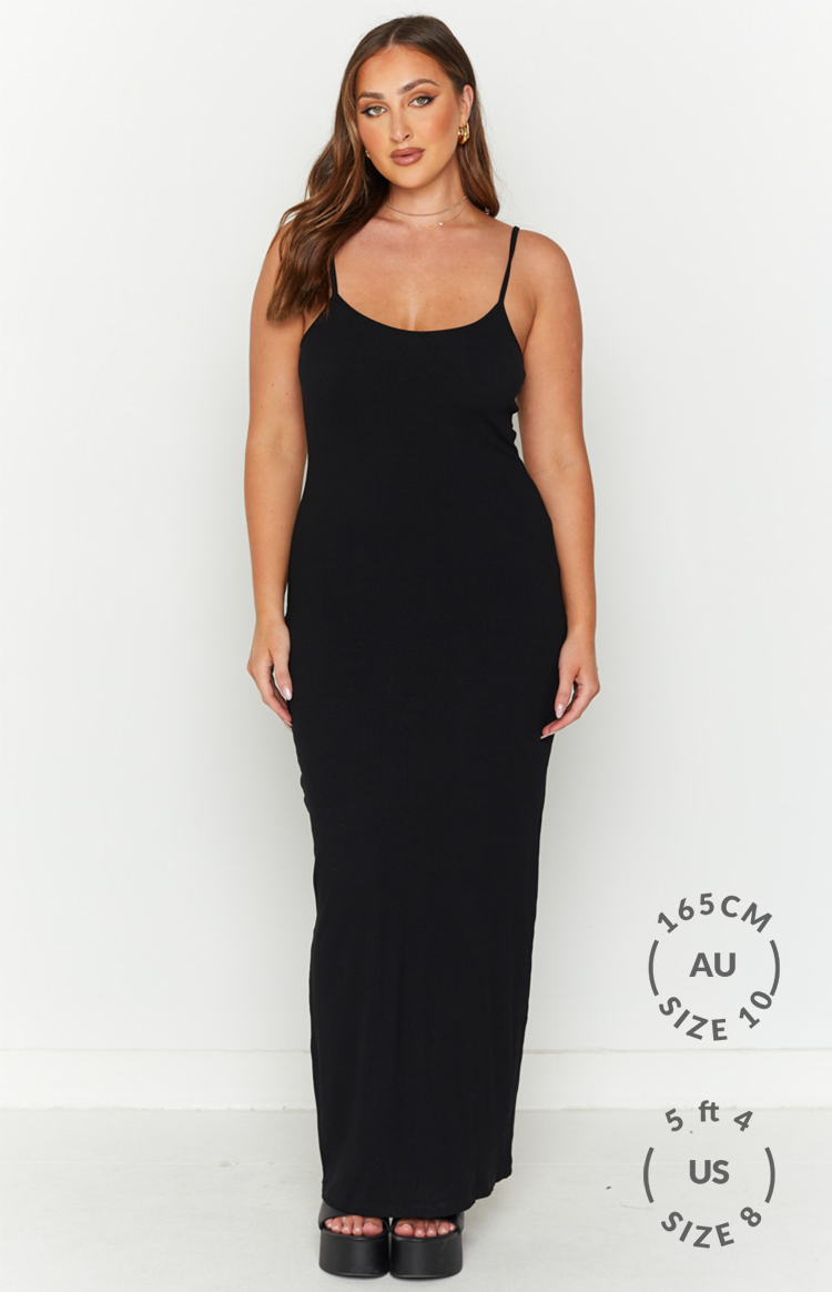 Black ribbed knit scoop neck maxi dress with thin spaghetti straps and a bodycon fit