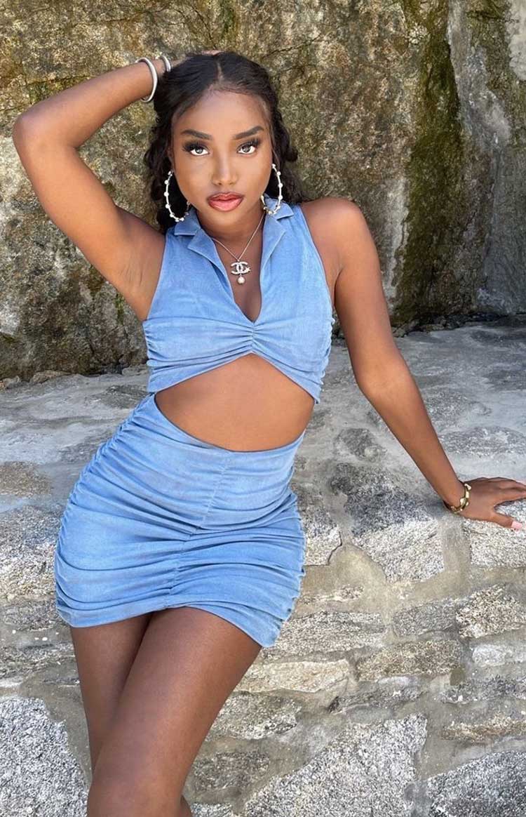 Blue collared V-neck mini dress with midriff cutout and ruched bodycon fit